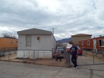 Victor Erives in front of his parents' home in El Paso. For the Observatory podcast.