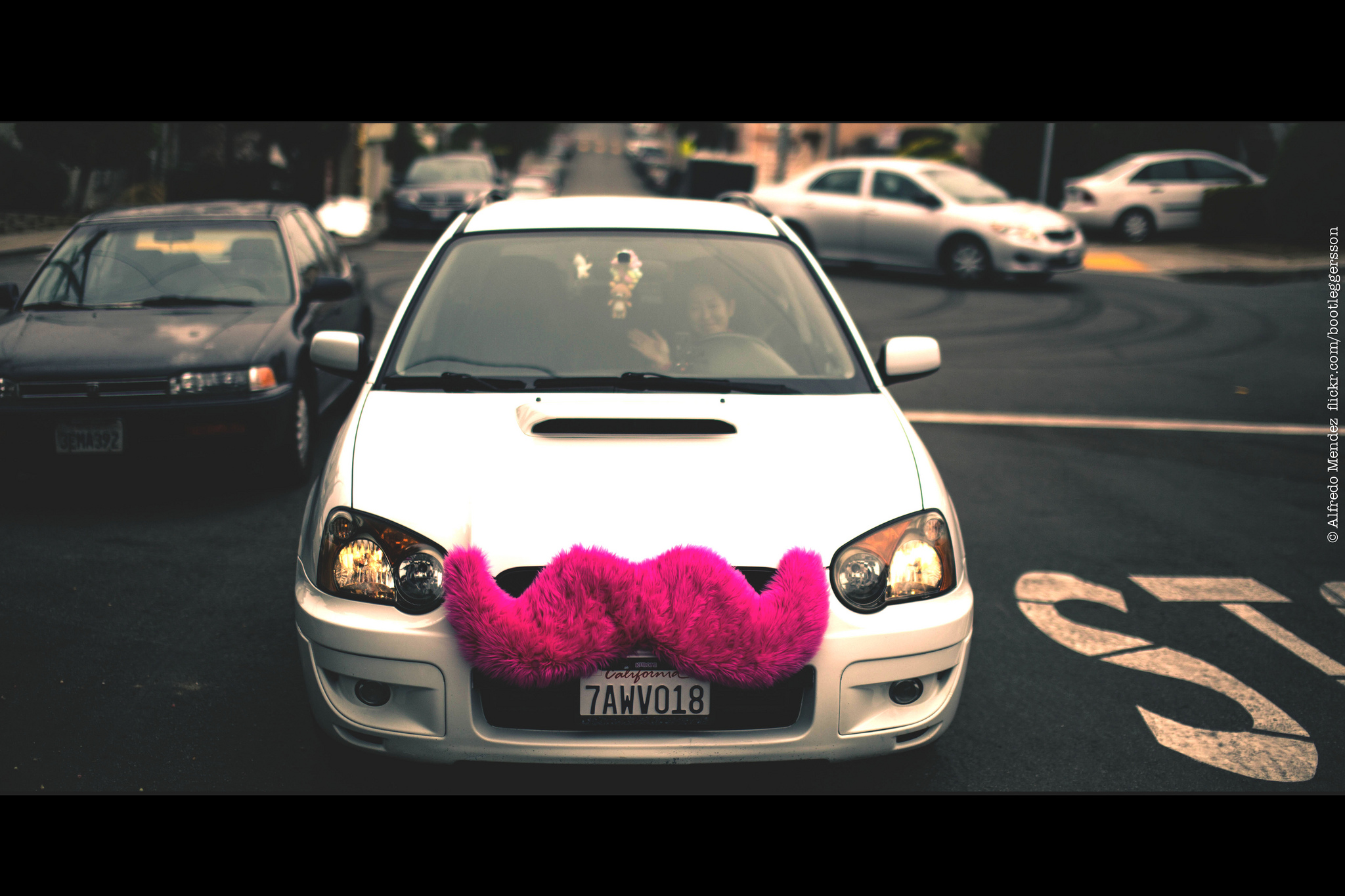 A Lyft car.