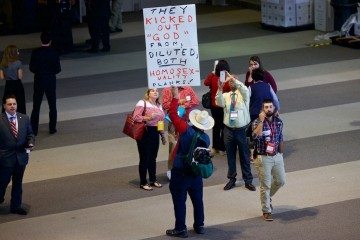 At the Texas GOP convention in Dallas in June, San Antonio activist Jack Finger protests the party's proposed language softening its stance on ex-gay therapy.