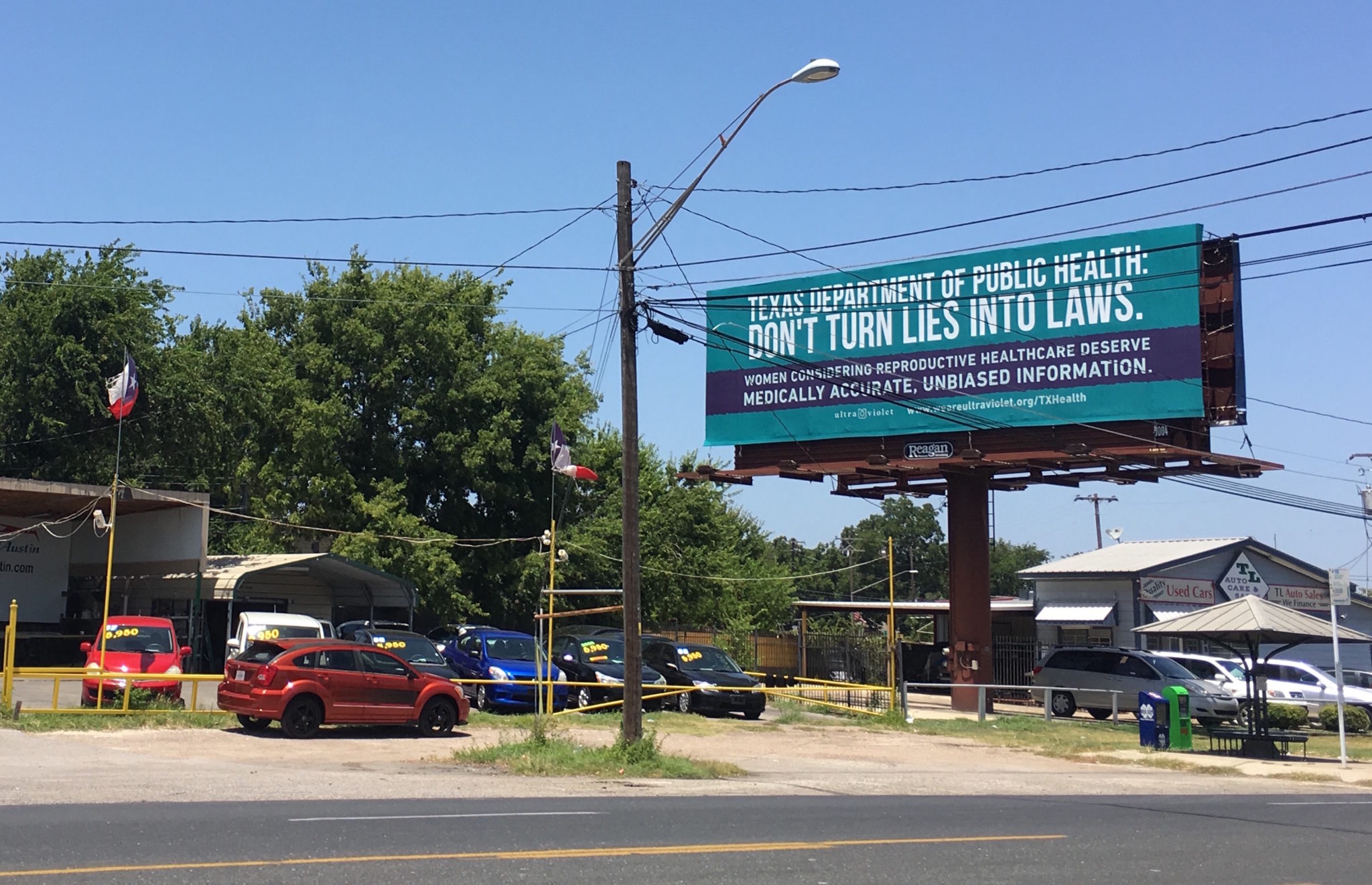 The group behind this Austin billboard imploring the state not to write more falsehoods into a pre-abortion booklet says Reagan Outdoor Advertising wouldn't accept the word "abortion" in their ad.