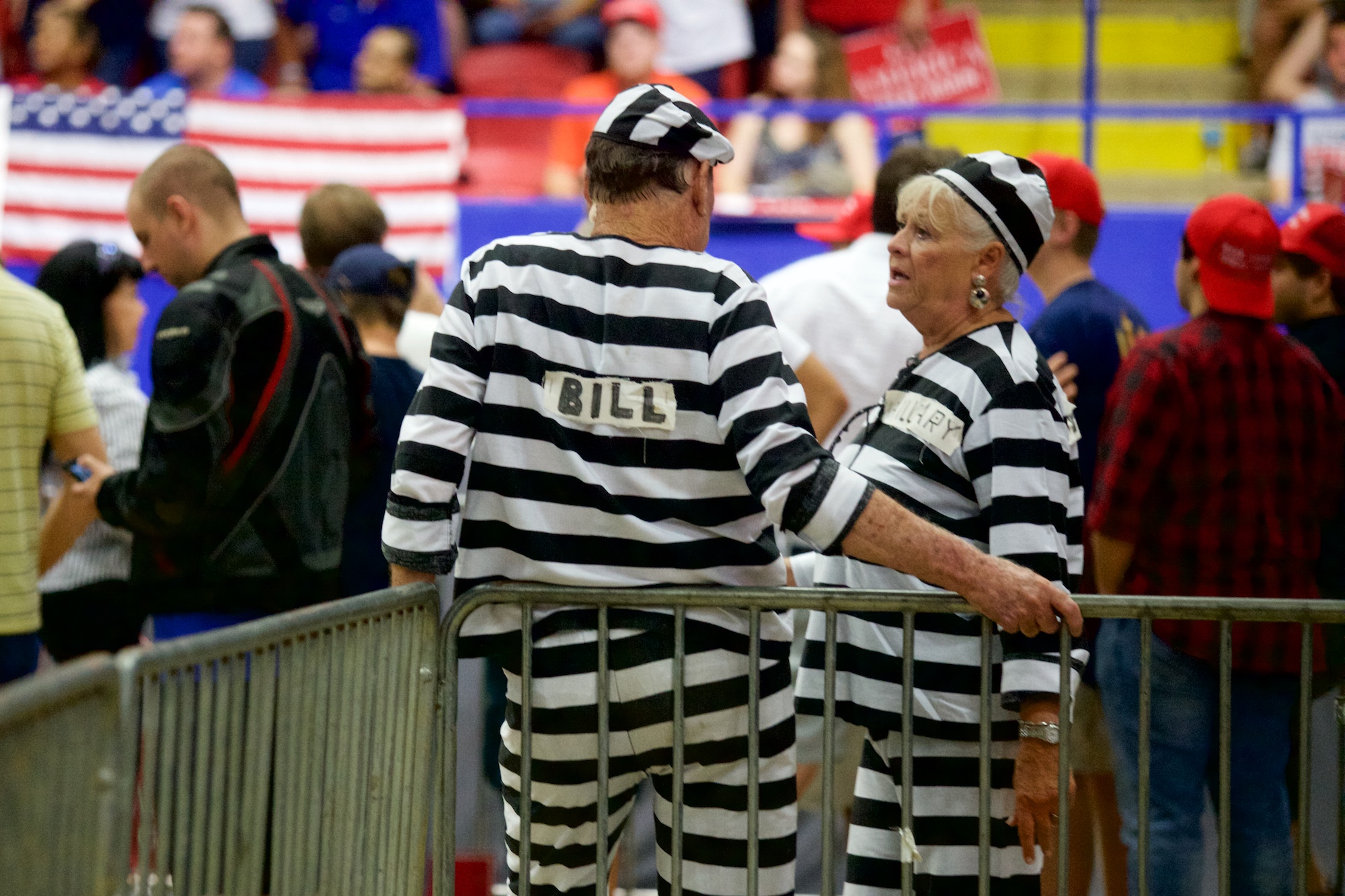 "Bill" and "Hillary" prisoner costumes