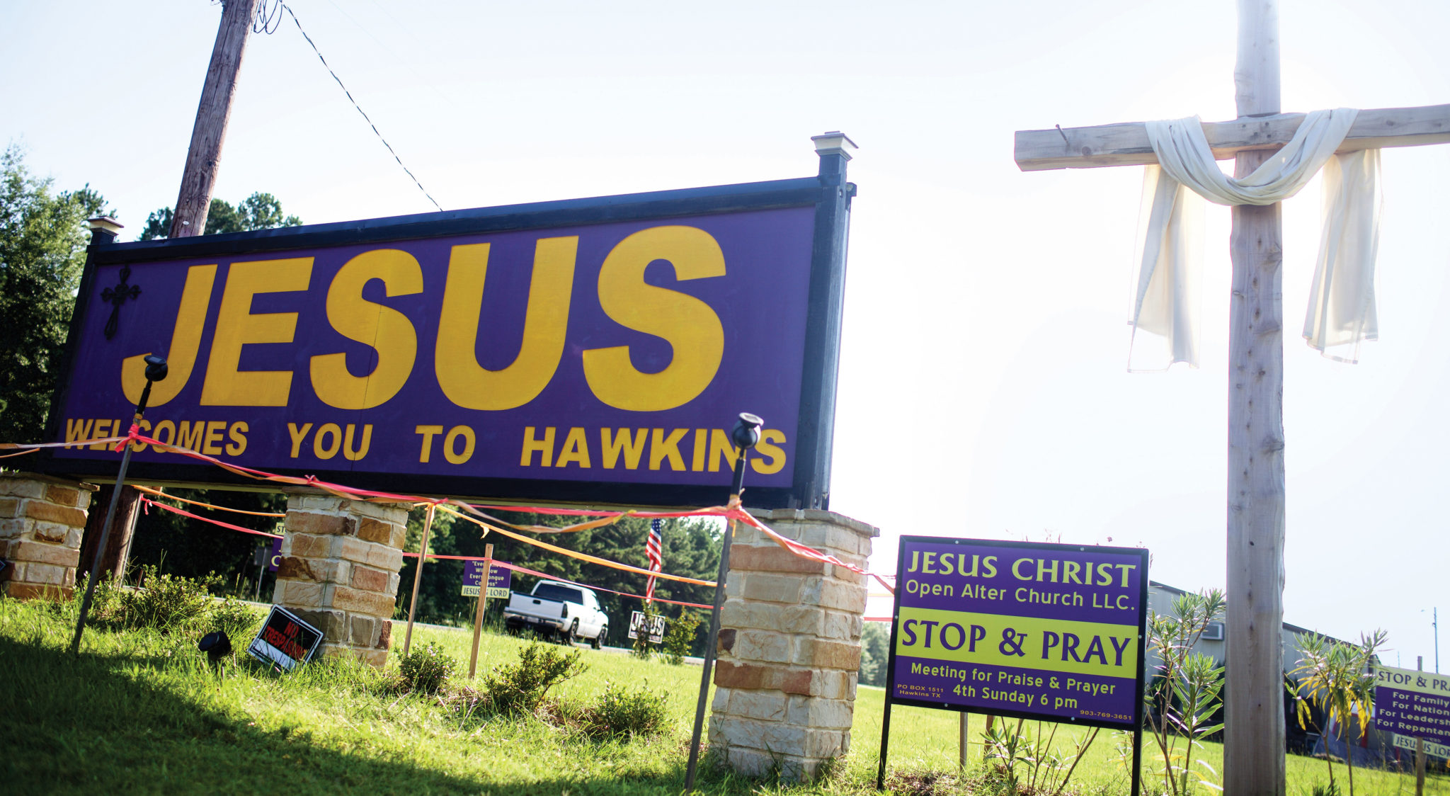 August 2016 postcard hawkins jesus sign