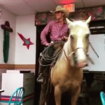 Lathan Crump in Taco Bell with his horse, Hollywood.