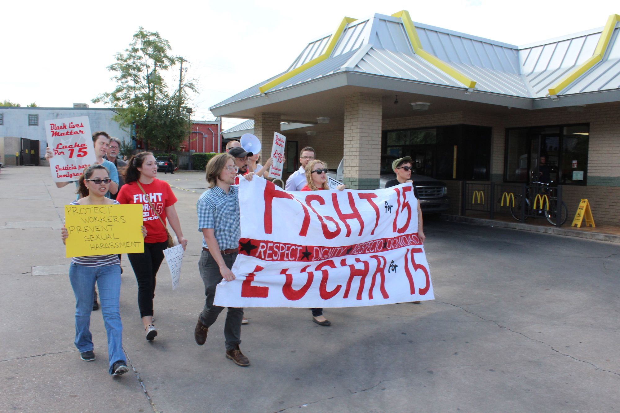 Labor rights demonstrators protest sexual harassment in the fast food industry at an Austin McDonald's. A new survey has found that 40 percent of women fast-food workers report being sexually harassed on the job.
