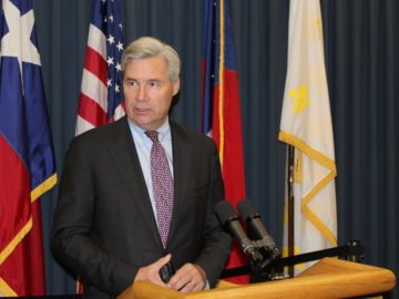 Senator Sheldon Whitehouse, D-Rhode Island, joined environmental activists at a press conference in Austin on Monday.