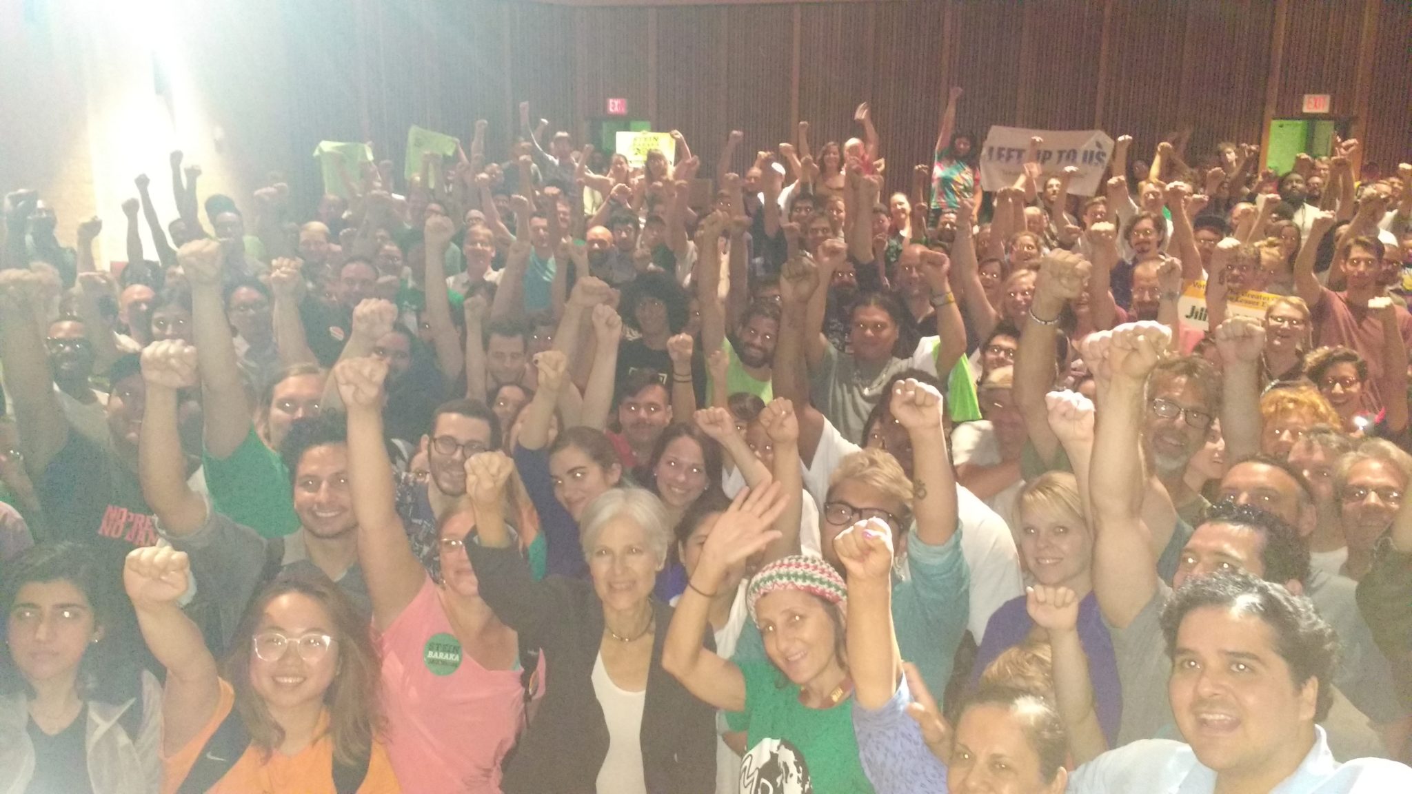 Jill Stein joins an Austin crowd for a photo-op after touting her "Green New Deal" plan.