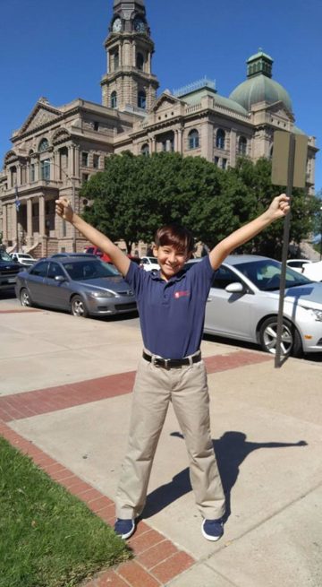 Ten-year-old Trevor Baize celebrates changing his name at the Tarrant County Courthouse in September. Baize is featured in Equality Texas' first trans tuesdays video