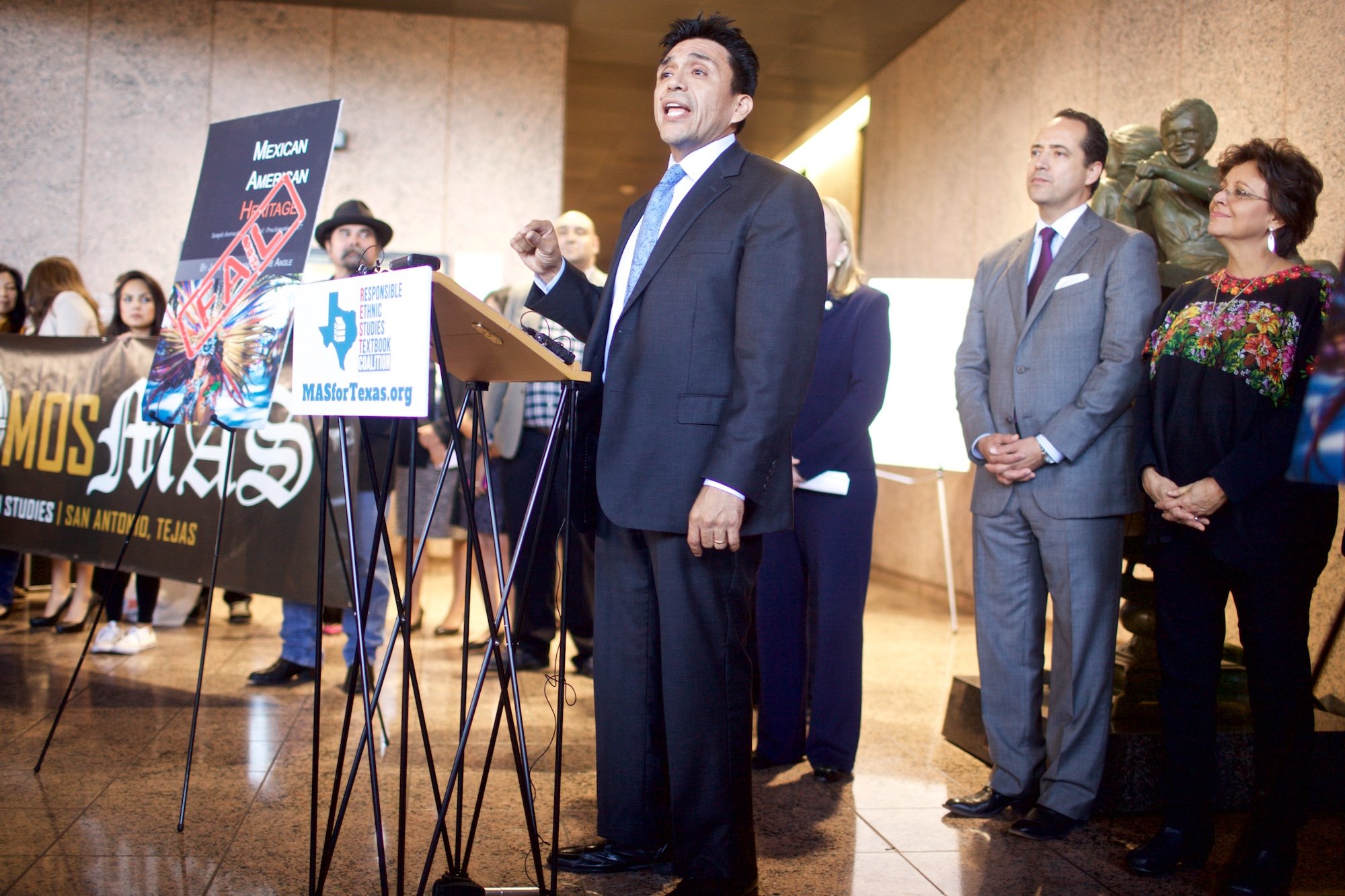 Houston author and activist Tony Diaz speaks against the textbook "Mexican American Heritage" at a press conference at the Texas Education Agency.