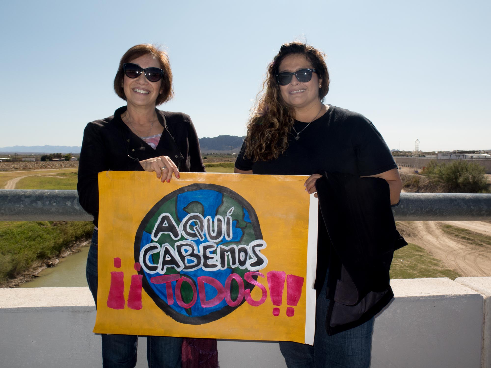 Leticia Garcia, of Marfa, left: “I grew up in a border town in Juarez near El Paso, and we never saw the differences or the walls being put up like they're trying to do now. Sister cities are great. I think economically both have an advantage to each other and together we can do things.” Azucena Carrasco, of Marfa: “I grew up in Mexico, well not full-time, but with my grandparents. As a child, I never really understood there was a border and then as you become an adult you start seeing the differences. It was important for me to come here to show that there is love across the border.”