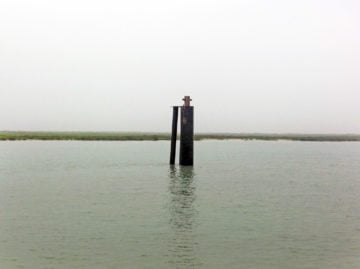One of the 82 steel mooring pilings the company proposed installing in the channel to tie off barges in deeper waters.