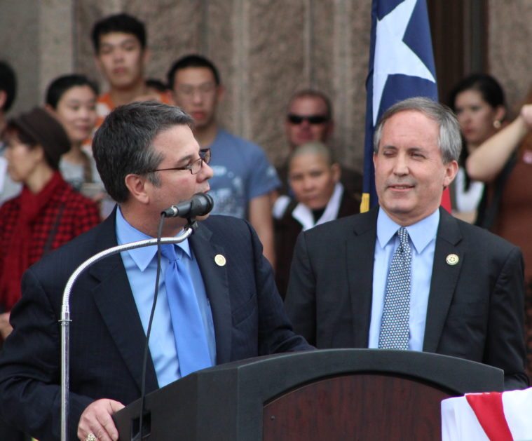 Senator Charles Perry, a Republican from Lubbock who authored SB 4, introduces Attorney General Ken Paxton during