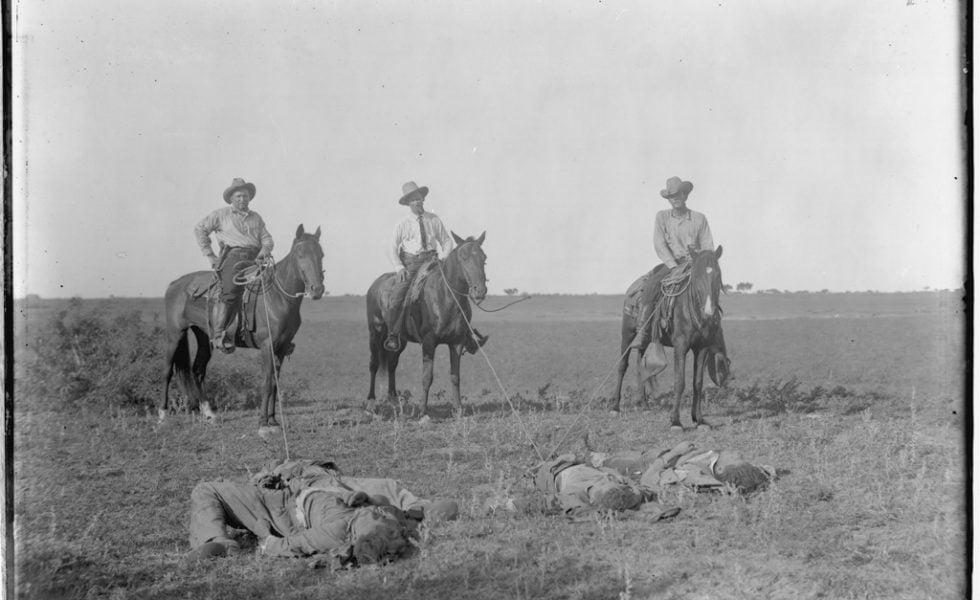 Captain James Fox (left), the massacre's ringleader, voluntarily retired and rejoined the Texas Rangers a few years after the massacre. This picture was taken following a raid in Brownsville.