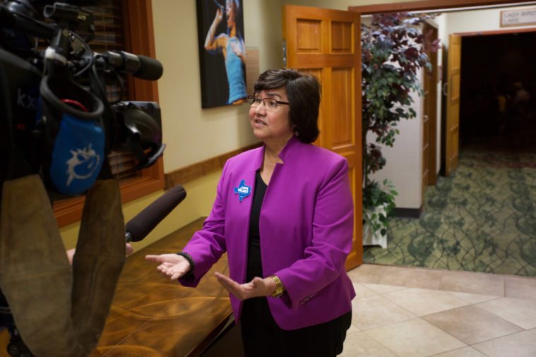 Lupe Valdez speaks to the media at the Texas Democratic Women Convention.