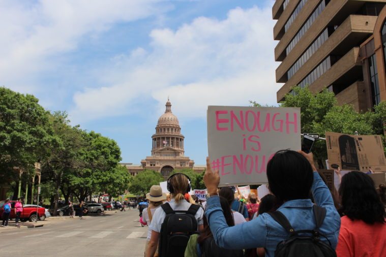 Students march at the Texas Capitol.