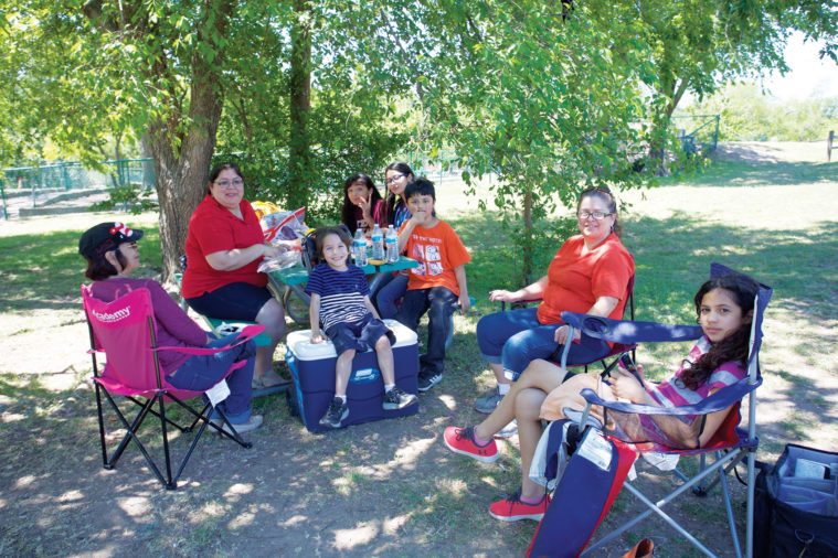 Caryl Ayala, center left, in Zilker Park with participants in Austin’s
“Sex Ed Sit Out,” which she organized.