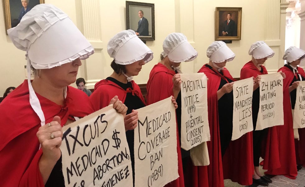 A <em>Handmaid's Tale</em>-themed protest in the Capitol to protest anti-abortion legislation in 2017.