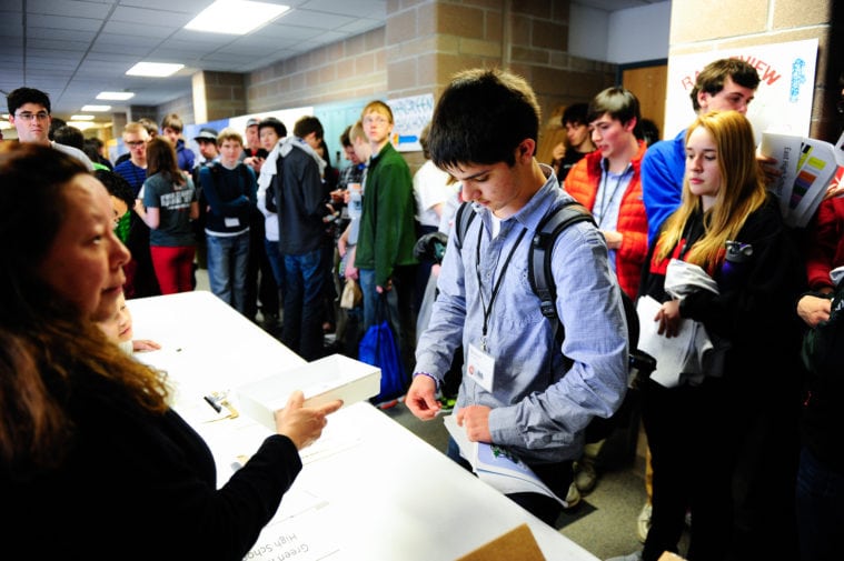 Schools are mandated to distribute voter registration applications to all eligible students twice per year.