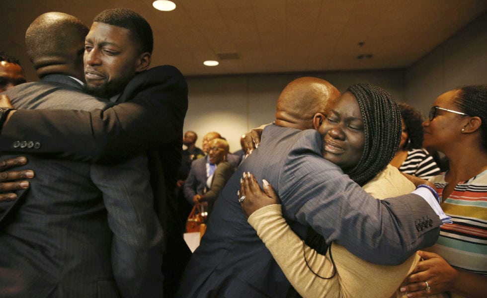 Odell Edwards and Charmaine Edwards, parents of 15-year-old Jordan Edwards, react to a guilty of murder verdict during a trial of fired Balch Springs police officer Roy Oliver.