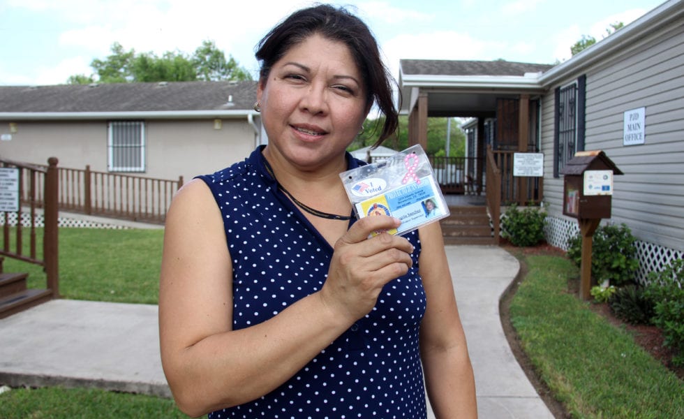 Organizer Lupita Sanchez shows her