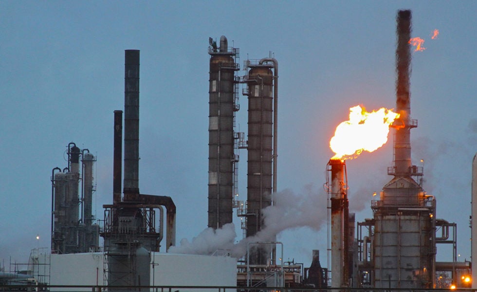 Distillation towers and flare at the Shell Deer Park Refinery.