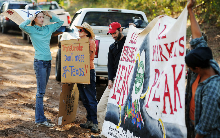 Spokesperson Cindy Spoon, left, talks with protesters at the future site of the Keystone XL/Trans-Canada Pipeline on Texas Highway 204 in 2012.