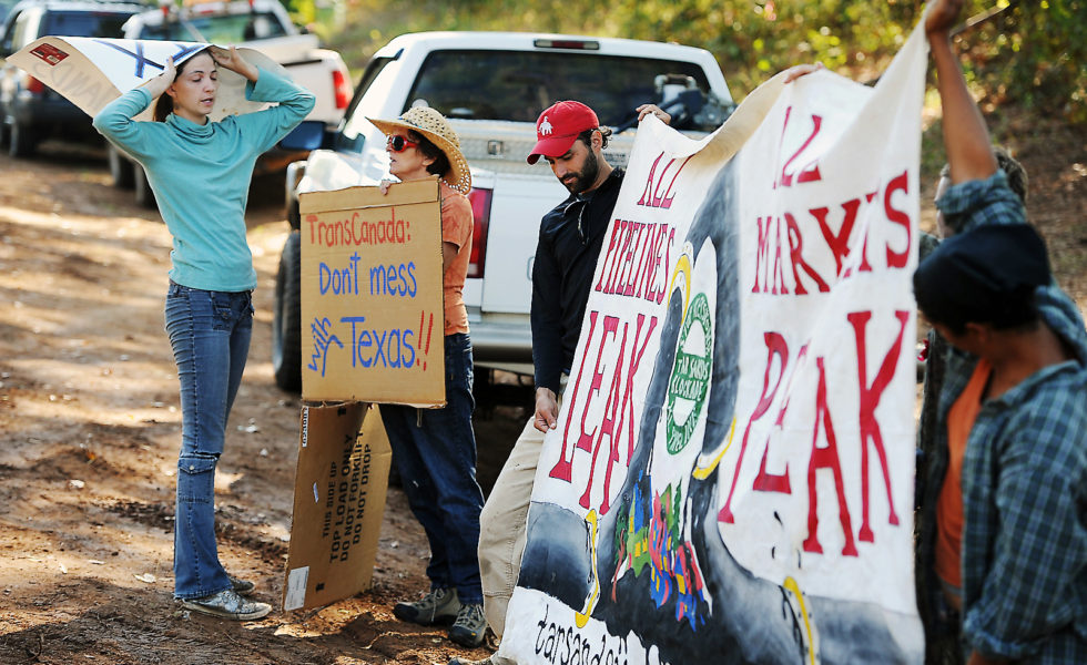 Spokesperson Cindy Spoon, left, talks with protesters at the future site of the Keystone XL/Trans-Canada Pipeline on Texas Highway 204 in 2012.