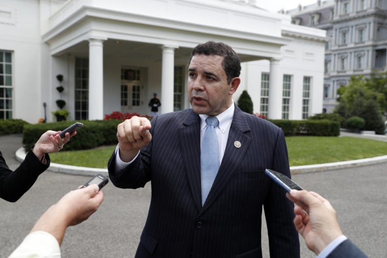 Representative Henry Cuellar speaks in front of the West Wing after a meeting with President Donald Trump in 2017.