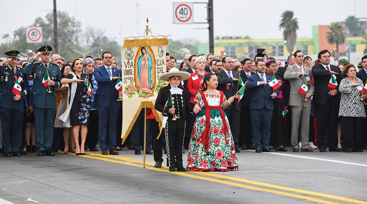 As part of Laredo's annual celebration of George Washington's birthday, children from Nuevo Laredo and Laredo embrace on the international bridge in an abrazo ceremony. Representing Mexico this year were Emiliano Perez Garza, left, and Miranda Montes Mendoza.