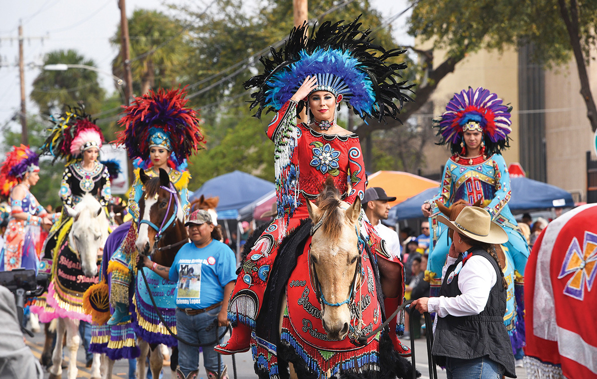 Members of the 2019 Princess Pocahontas Court ride down San Bernardo Avenue during the parade