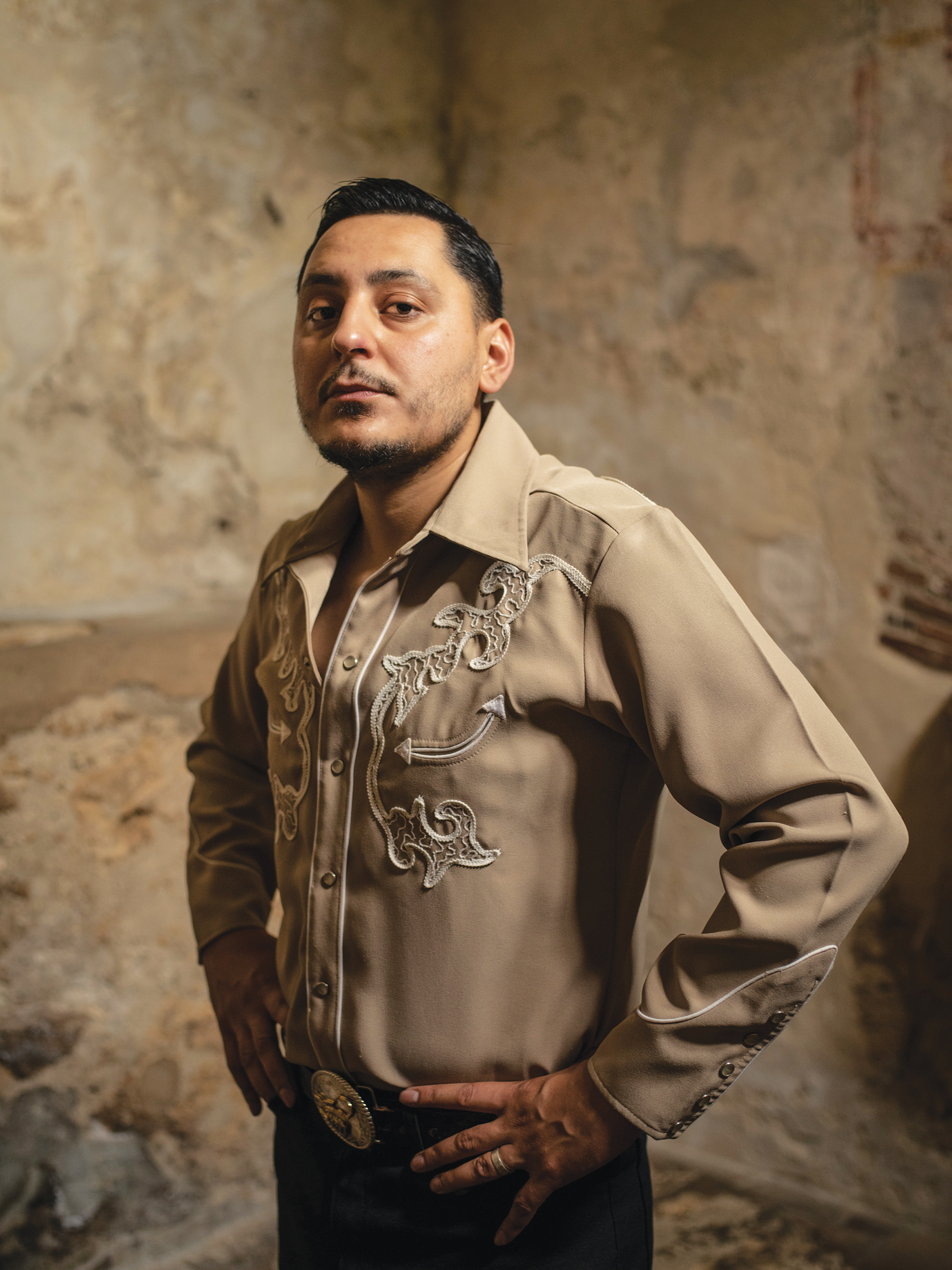 "I always say that if your work doesn't cause any type of reaction, there's something wrong with it," says artist Jose Villalobos, photographed inside San Antonio's Mission Concepción.