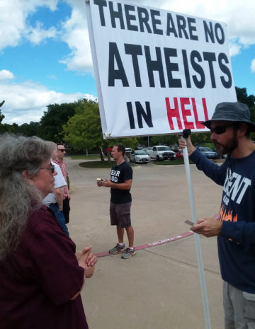 A fundamentalist protester at at the Metroplex Atheists’ July event.