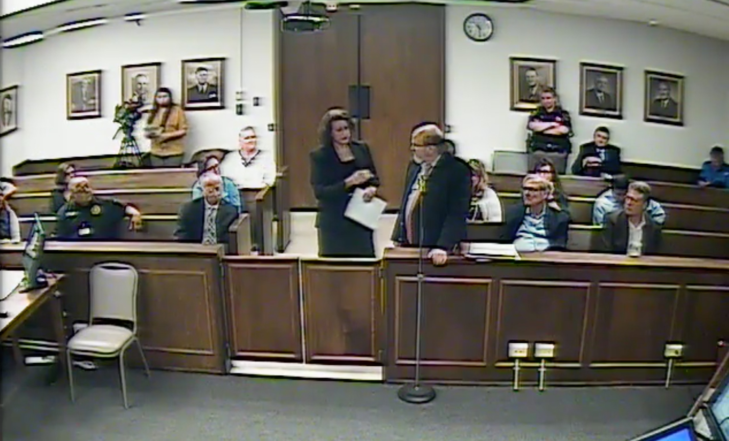 Constance Filley Johnson (left) speaks to the Victoria County Commissioners Court on April 15. 