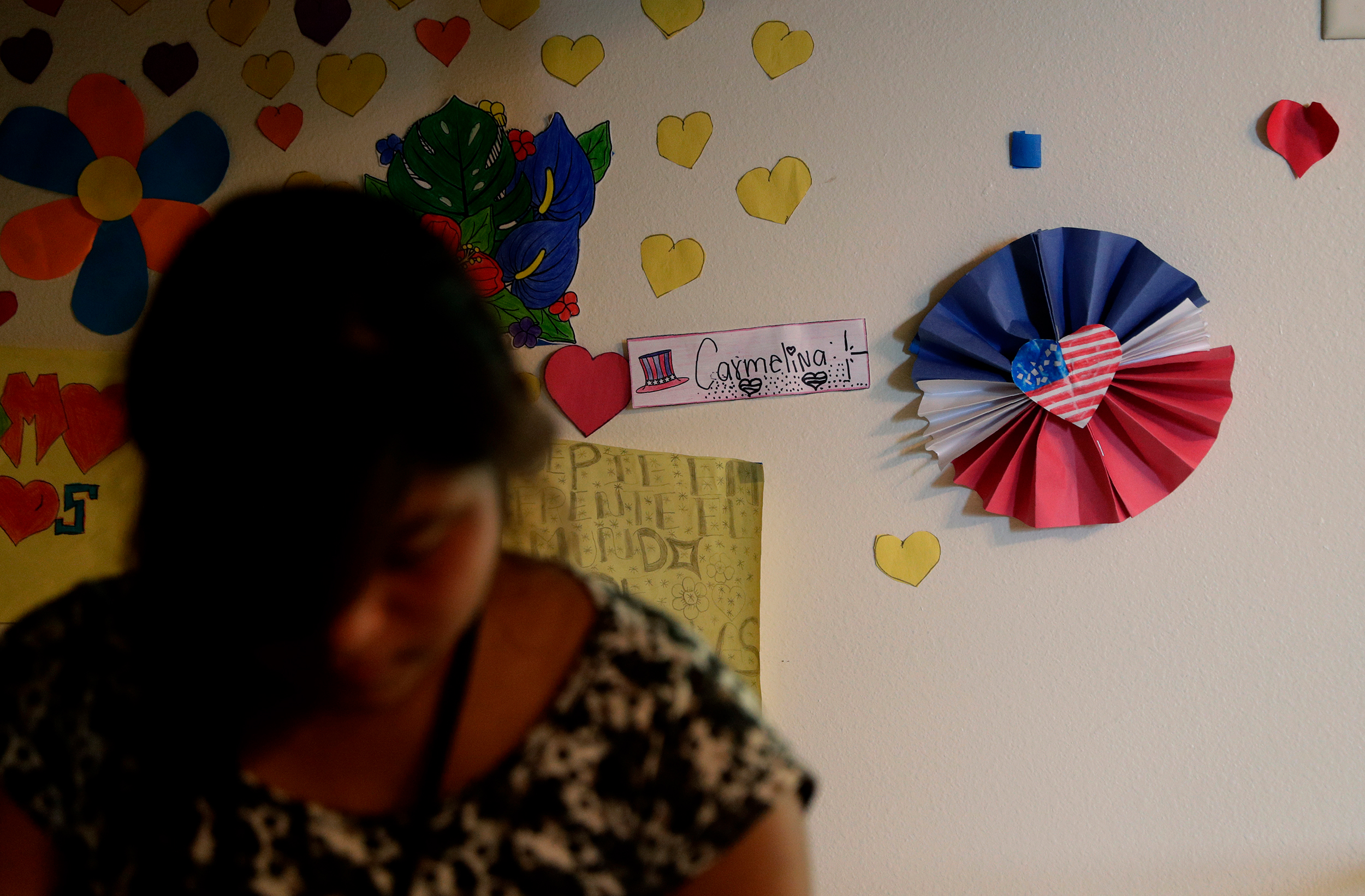 In this July 9, 2019, photo, decorations cover the walls of rooms of immigrants at the U.S. government's newest holding center for migrant children in Carrizo Springs, Texas. Long trailers once used to house oil workers in two-bedroom suites have been turned into 12-person dorms, with two pairs of bunk beds in each bedroom and the living room. (AP Photo/Eric Gay)