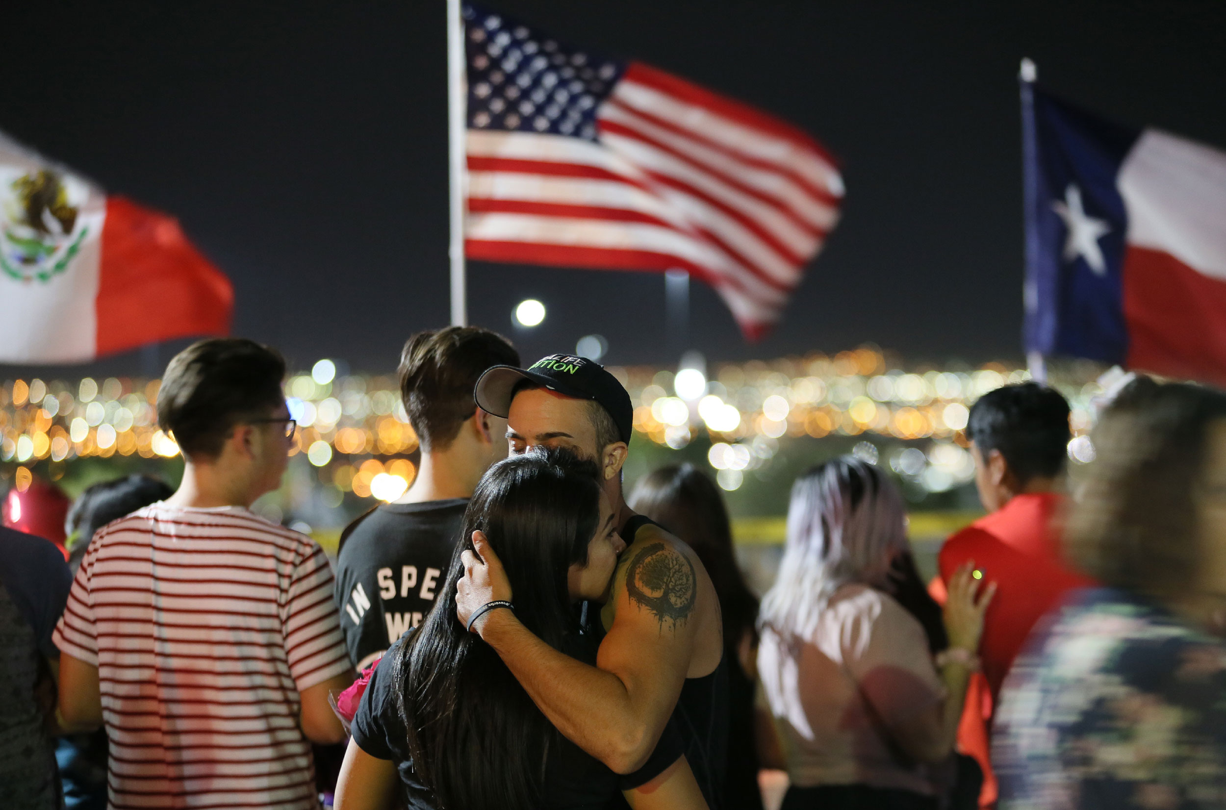 El Pasoans show up in masses Monday, August, 5, 2019, to pay their respects to those who lost their lives in an attack that killed 22 people and wounded 24 others. A tragedy like the August, 3, mass murder brought togther an otherwise peaceful community of 700,000; 2 million when you count.