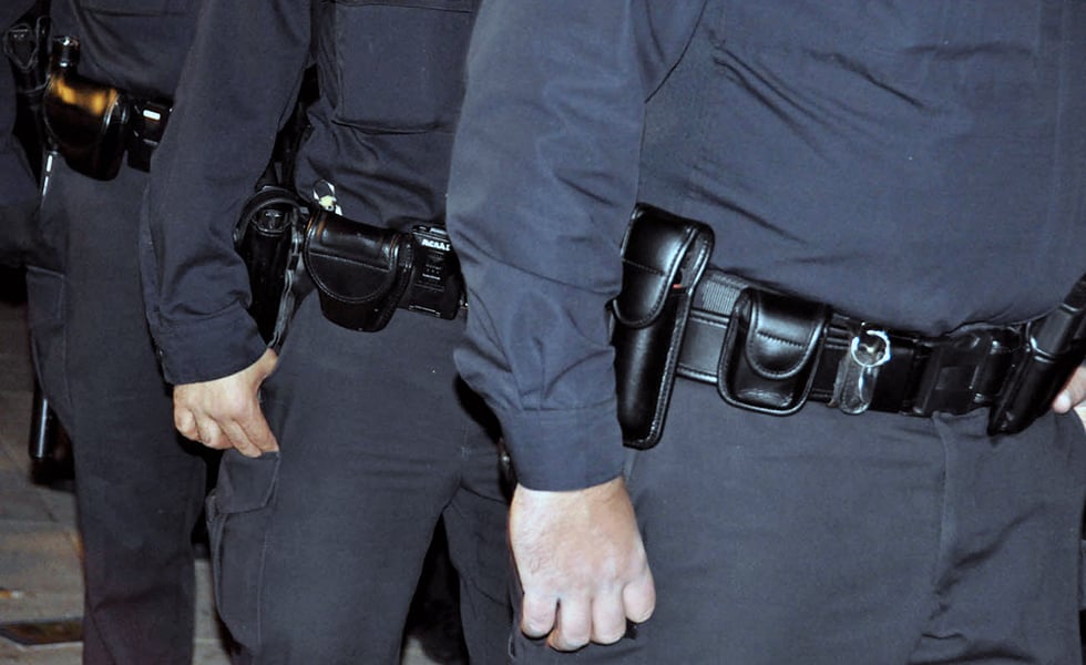 Police arrest Occupy Austin protesters outside Austin City Hall in 2011.