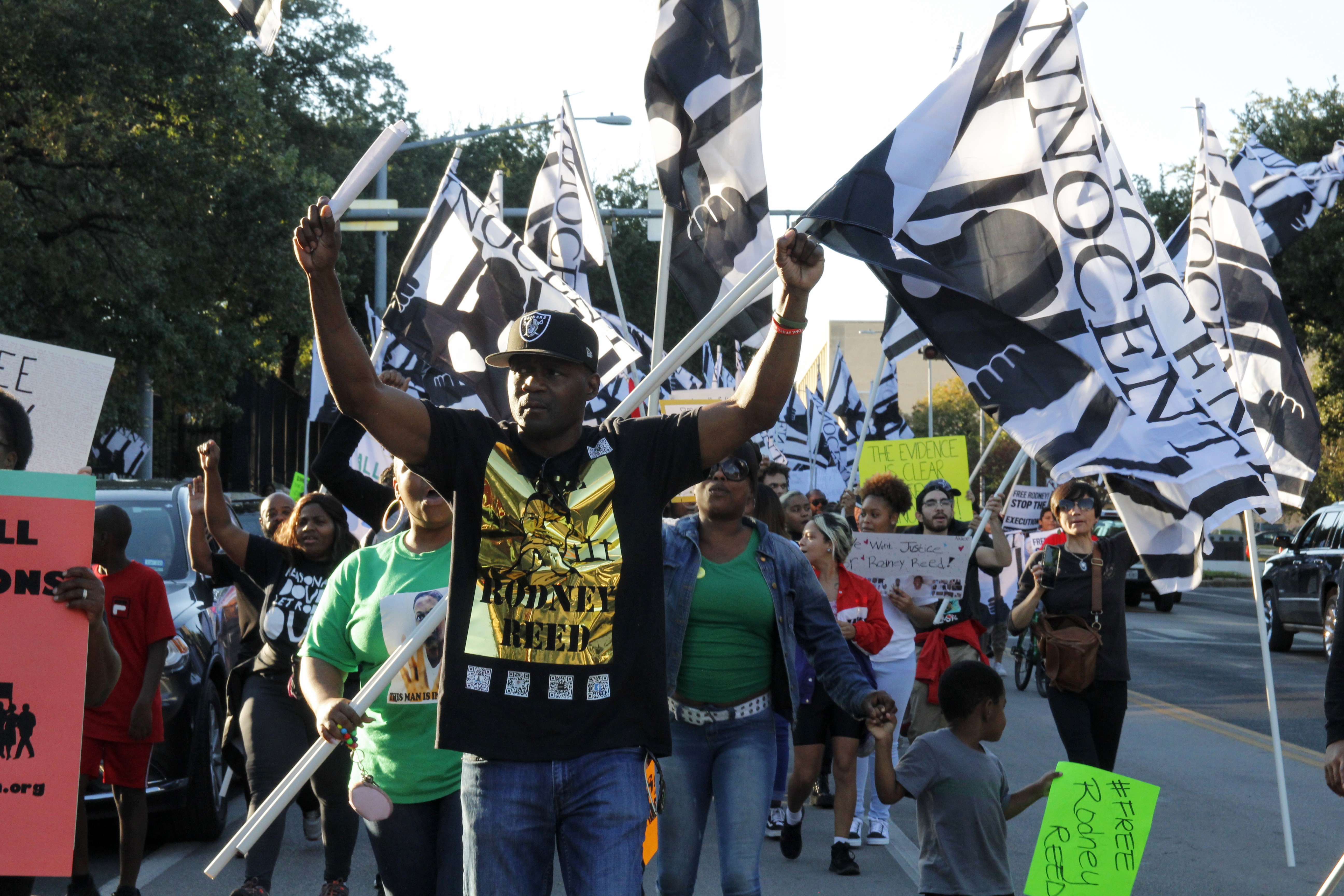 Roderick Reed, the younger brother of Rodney Reed, leads protesters in a march.