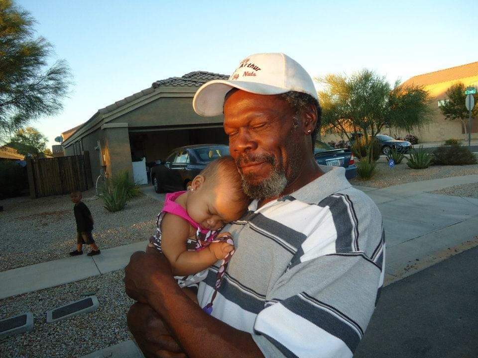 Robert Mosley and his granddaughter.