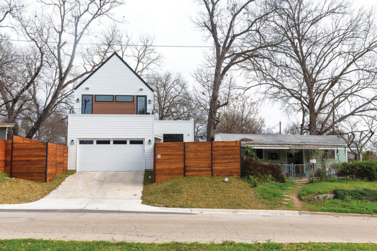 Cars first East Austin Adding people in Texas means adding cars, either because transit is infrequent or unreliable, or because driving is a hard habit to break. That Texans are essentially required to own a car in sprawling cities that don’t always have sidewalks, let alone dedicated bike lanes, leads to architecture that greets visitors with a garage door. Presumably, there’s a doorbell there somewhere.