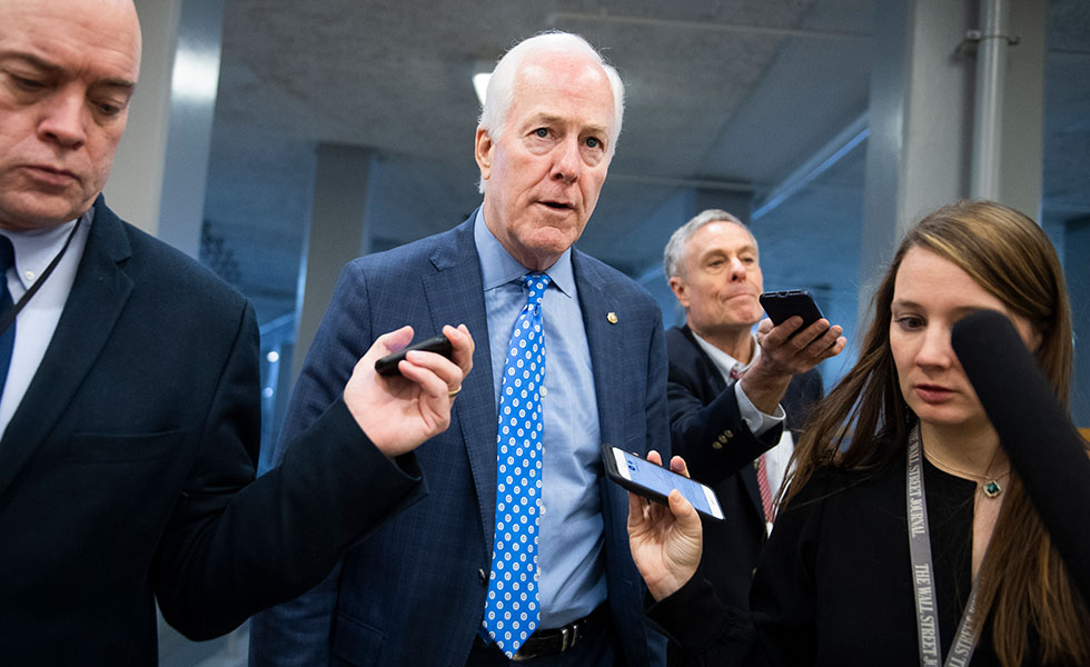 Sen. John Cornyn, R-Texas, talks with reporters in the senate subway before the continuation of the impeachment trial of President Donald Trump on Tuesday, January 28, 2020. (Photo By Tom Williams/CQ Roll Call via AP Images)