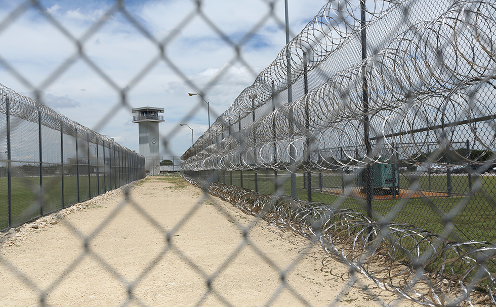 This Wednesday, June 21, 2017 photo shows barbed wire surrounding the prison that holds Jason Robinson, 39, in Gatesville, Texas. Robinson was convicted of murder at 16 and sentenced to automatic life with the possibility of parole. States are responding to U.S. Supreme Court rulings that have found mandatory life-without-parole sentences unconstitutional for juveniles except for the rare homicide offender incapable of rehabilitation. After the latest ruling in January 2016 said those serving such terms must have a chance to argue for release one day, dozens of inmates have won new sentences — and some, freedom — while others wait or fight to have their sentences reviewed. (AP Photo/Jaime Dunaway)