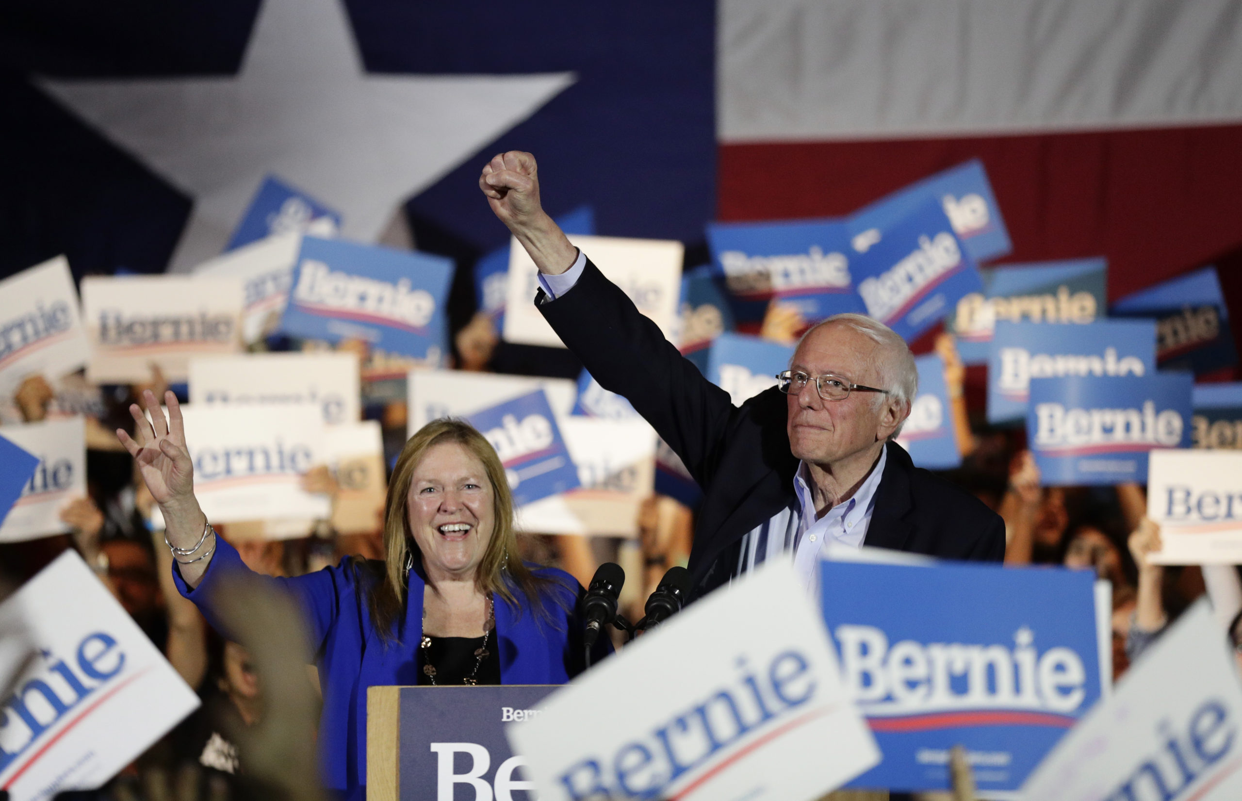 Bernie Sanders surrounded by supporters at a campaign rally in Texas.
