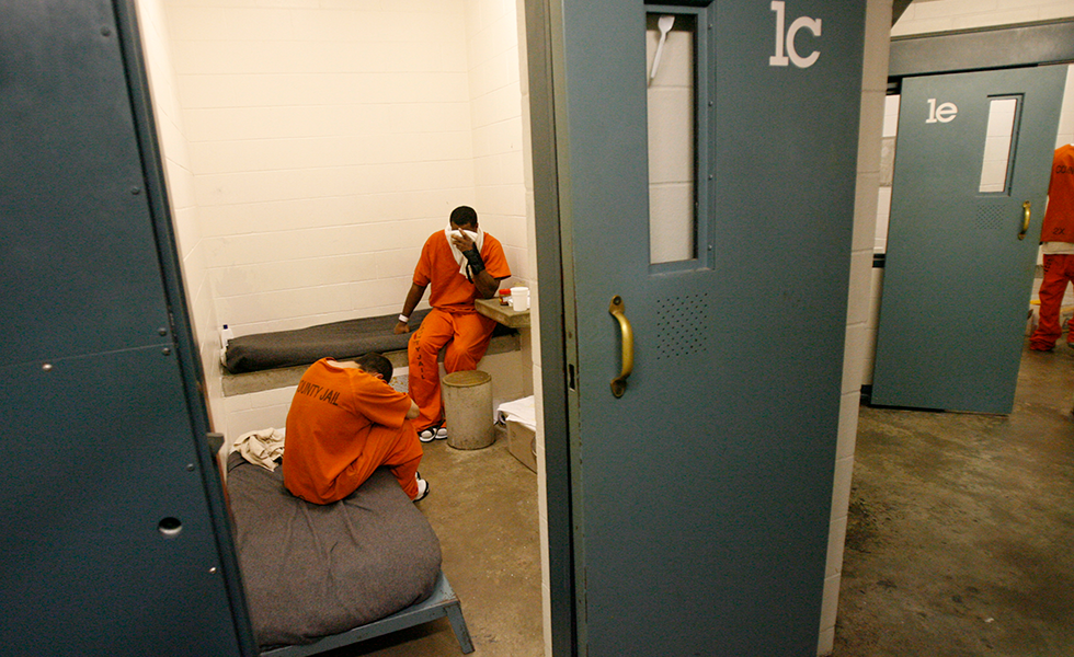 Inmates are seen inside the Harris County Jail on Friday, May 5, 2006, in Houston. State officials have ordered Harris County to raise staffing levels to the state mandate at its overcrowded jail, and county officials said Friday they hope to avoid having to ship inmates elsewhere in the state. (AP Photo/Melissa Phillip, Pool)