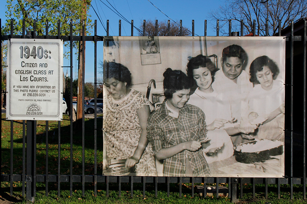 To promote Alazán-Apache’s history, Sánchez's organization has tied black-and-white photographs of former residents to fences around the complex.