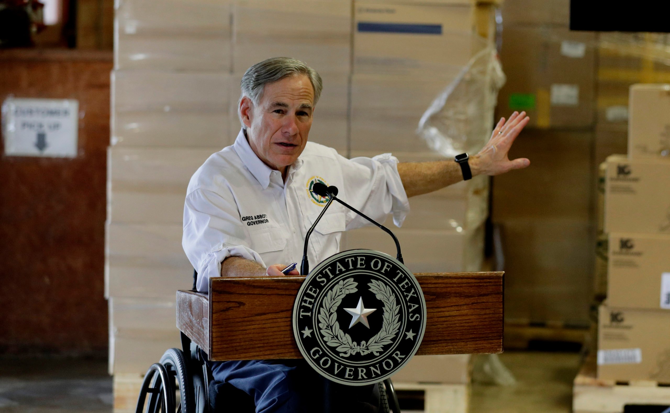 Texas Gov. Greg Abbott gives an update on the COVID-19 outbreak at the Texas Department of Public Safety warehouse facility in Austin, Texas, Monday, April 6, 2020. (AP Photo/Eric Gay)