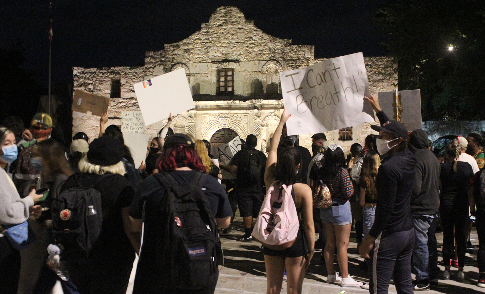 protesters outside the alamo