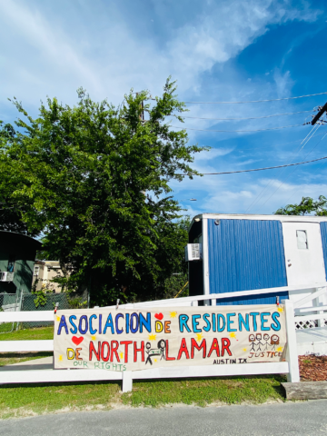 sign: associacion de residentes north lamar
