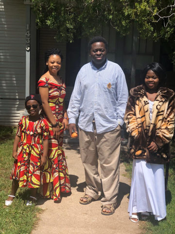 Mfaume Lawi and his daughters.