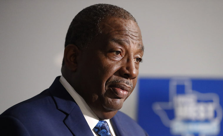 State Senator Royce West responds to questions during a broadcast interview after announcing his bid to run for the US Senate during a rally in Dallas, Monday, July 22, 2019. (AP Photo/Tony Gutierrez)