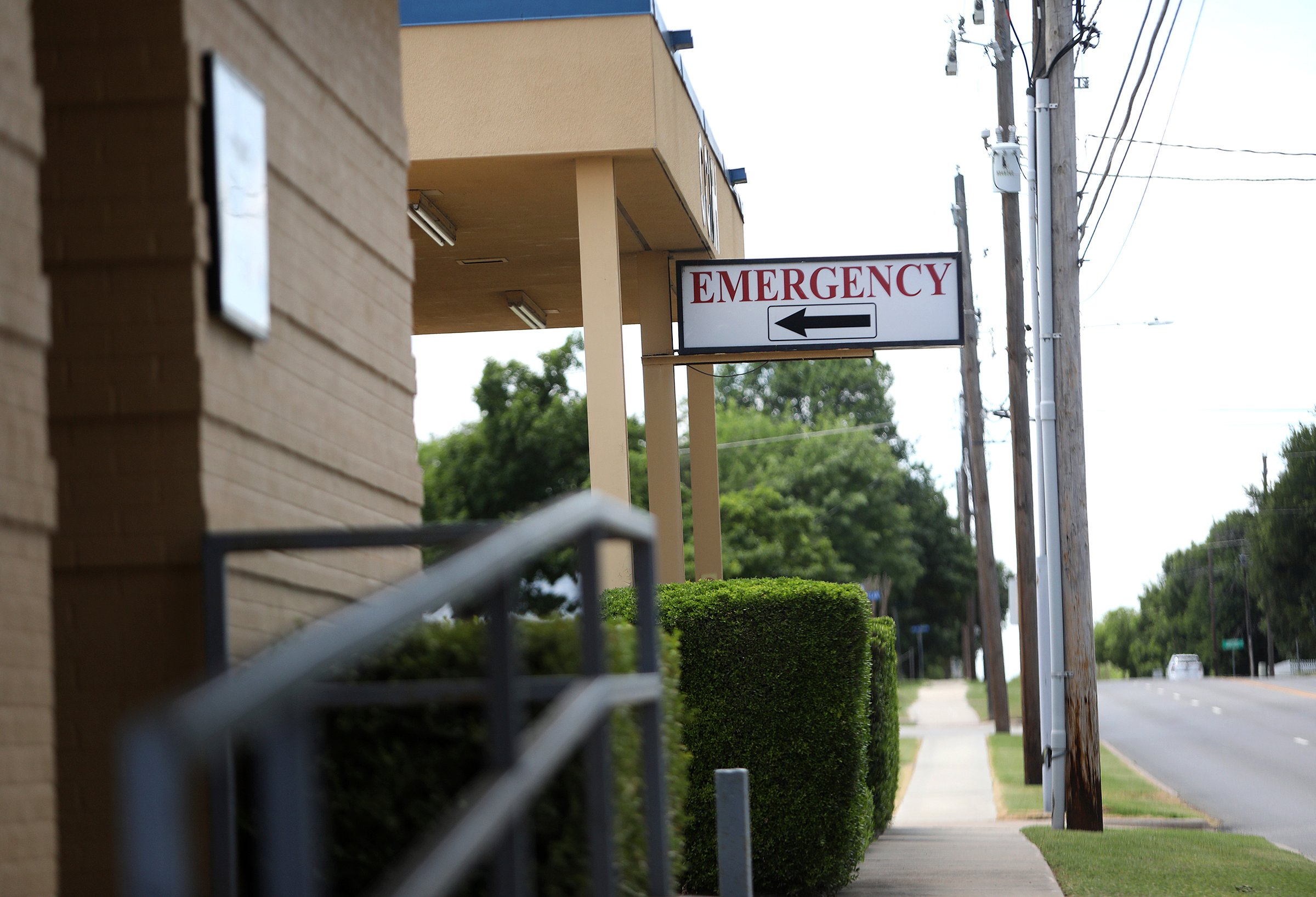 A sign points to the emergency room of Clay County Memorial Hospital on Friday, May 8, 2020. Residents of rural Clay County can get coronavirus tests at the local hospital with appointments from their health care provider. (Amanda McCoy/Fort Worth Star-Telegram via AP)