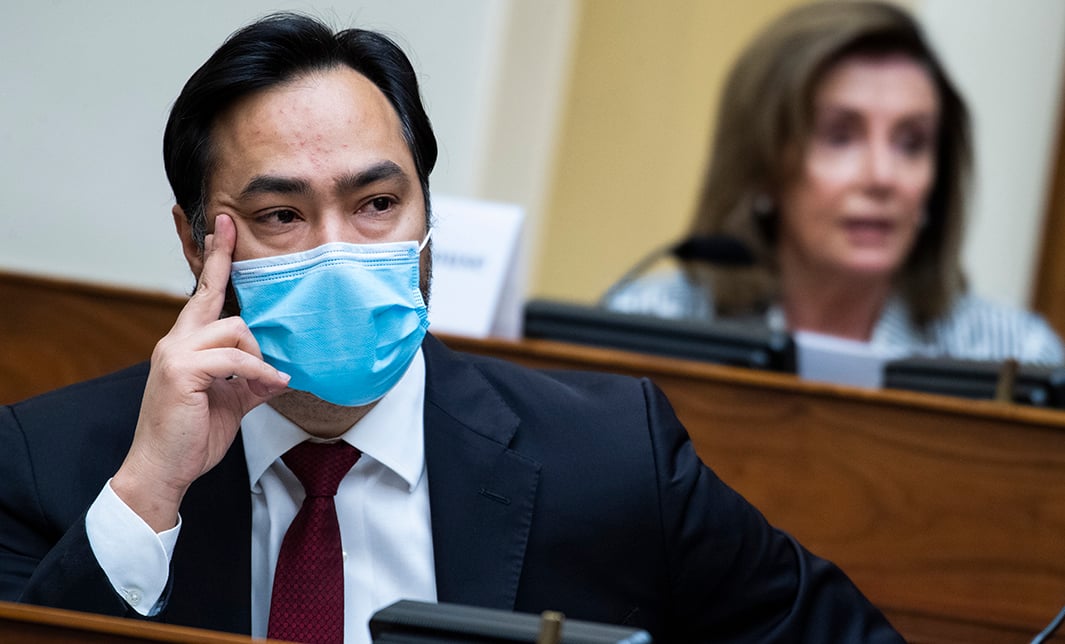 UNITED STATES - JULY 1: Rep. Joaquin Castro, D-Texas, looks on, as Speaker of the House Nancy Pelosi, D-Calif., makes a statement during the House Foreign Affairs Committee hearing titled "The End of One Country, Two Systems?: Implications of Beijing's National Security Law in Hong Kong," Rayburn Building on Wednesday, July 1, 2020. (Photo By Tom Williams/CQ Roll Call via AP Images)